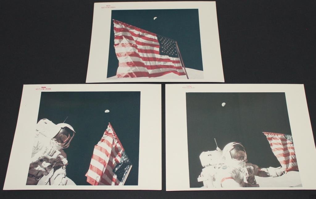 Three Apollo 17 Lunar Surface Numbered Glossy Photos: A group of 3 vintage 8"x 10" NASA color numbered glossy photos, on heavy paper stock, showing the US flag on the moon from the Apollo 17 mission. Toned a bit with age, and a couple minor soft corners,