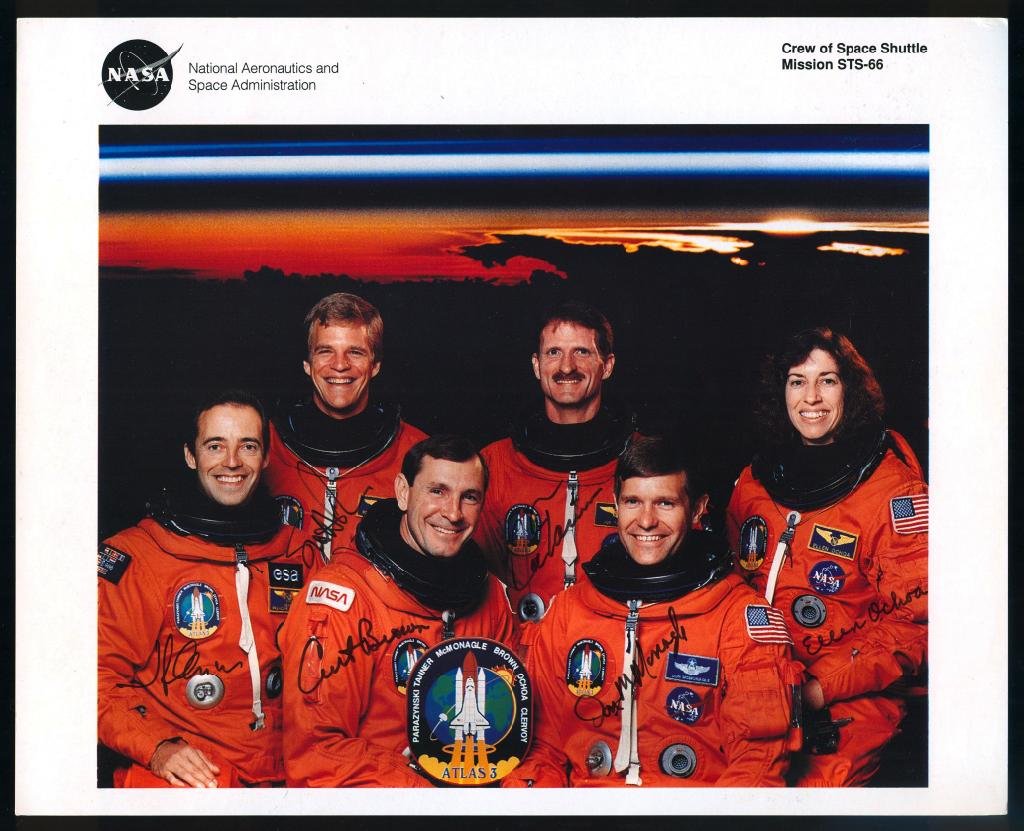 STS-66 Crew-Signed NASA Litho: An 8"x 10" NASA color litho signed by the STS-66 crew. A small top right corner ding, but otherwise great shape.