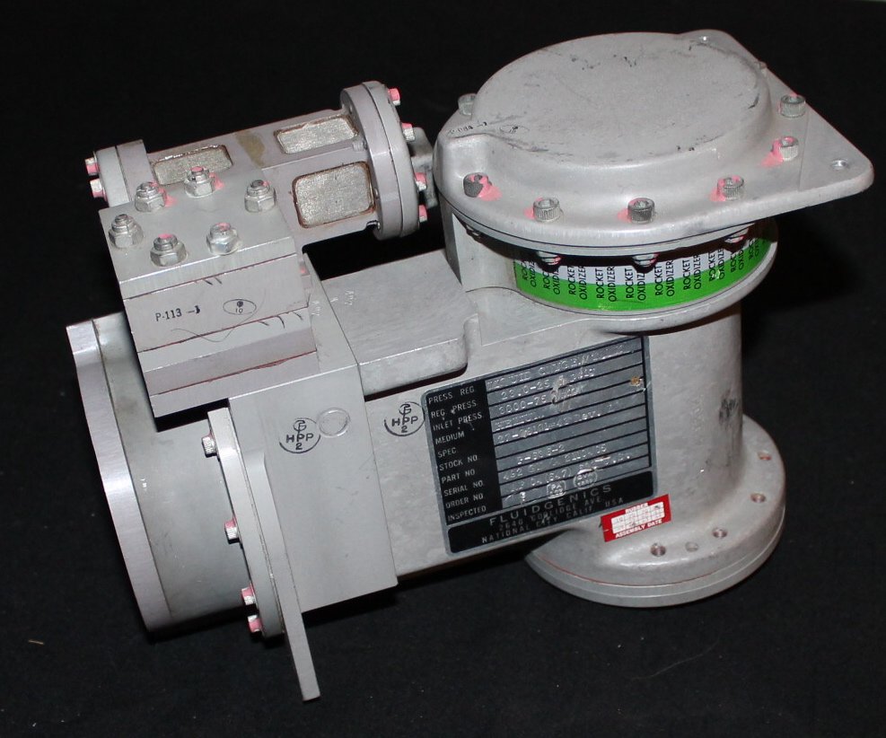 Atlas Rocket Liquid O2 Tank Pressure Regulator: An Atlas Rocket Liquid Oxygen Tank Pressure Regulator Assembly (helium) from Fluidgenics dated 4Q-62, and built to withstand a pressure of 3000-3015 psig. Rocket Oxidizer inlet marked with tape. It me