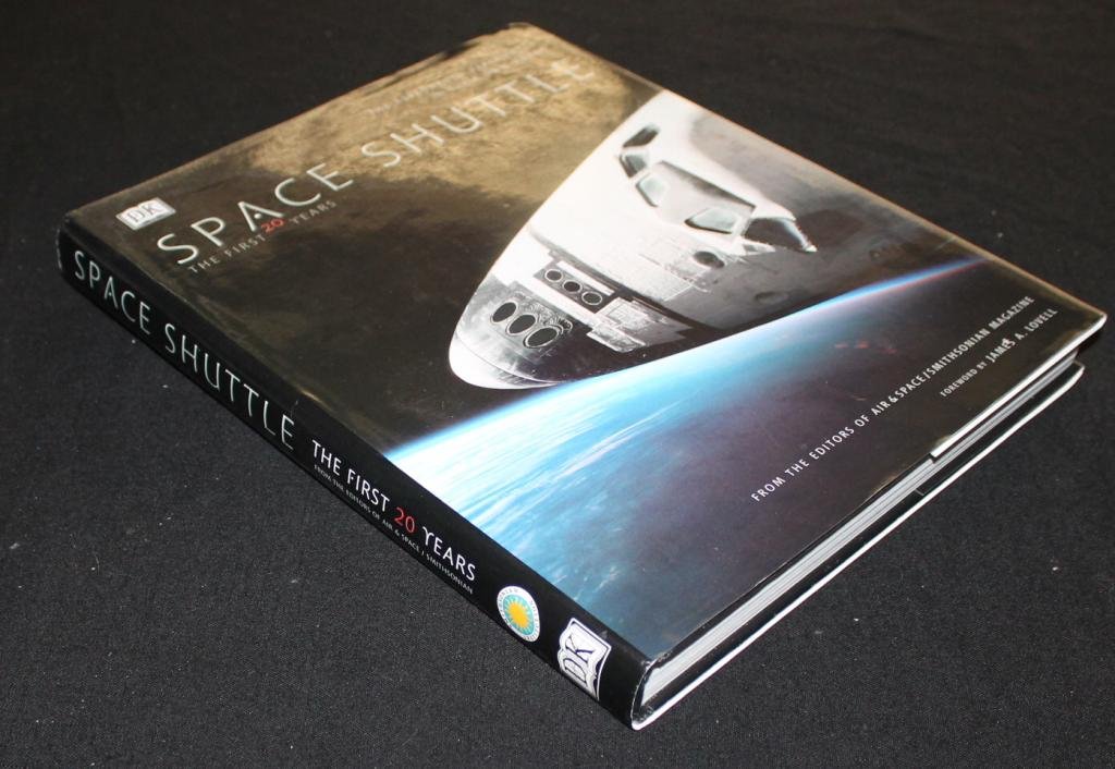 Twenty Astronaut Signatures in 'Space Shuttle' Book: A large 9.5"x 11.5" hardbound coffee table book 'Space Shuttle' signed on the title page by 20 astronauts and others including Brand, Weitz, Wendt, Lousma, Usachev, Crippen, McCandless, Seddon and man