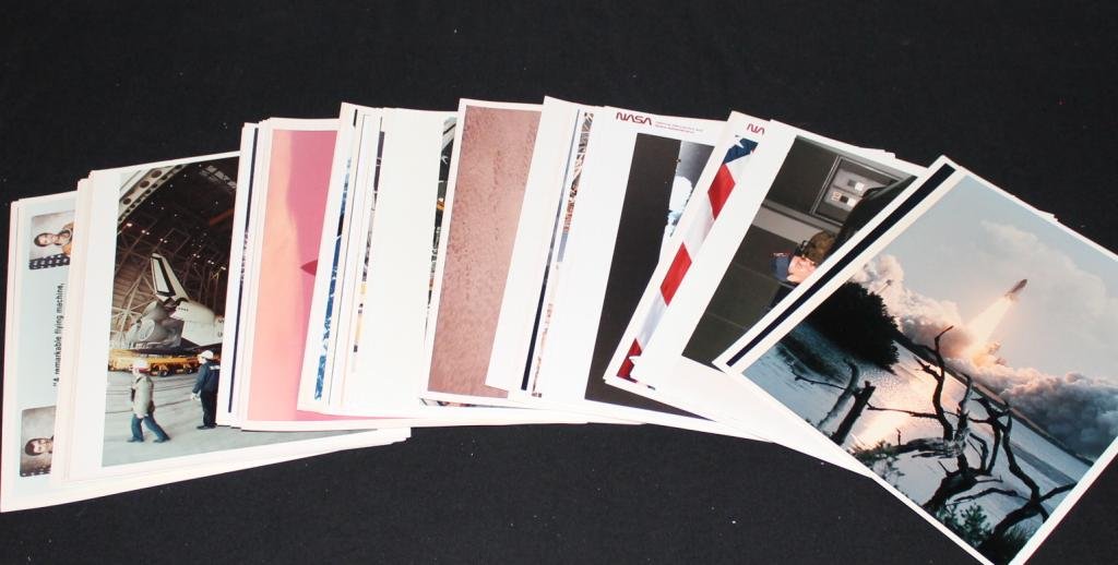 Group of Over 60 Space Shuttle NASA Glossy Photos: A large group of over 60 Space Shuttle color glossy photos from NASA, old and new, covering all aspects of the program. Vast majority in great condition.