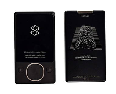 JOY DIVISION ZUNE PLAYER 1: JOY DIVISION ZUNE PLAYER 1."This was to be the competition to the Ipod. A wonderful package. Suggested by Tom Atenscio our American manager, and graphics designed by Peter Saville. It features a custo
