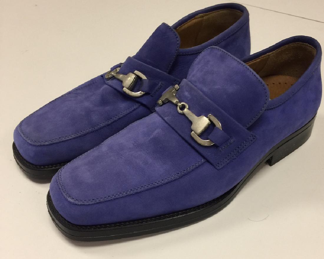 ROCK & ROLL MUSEUM DENMARK - CARL PERKINS' BLUE SUEDE: ROCK & ROLL MUSEUM DENMARK - CARL PERKINS' BLUE SUEDE SHOES. A pair of Carlo Morandi blue suede shoes (US size 7.5), owned by Carl Perkins and formerly displayed in his restaurant 'Suede' In Jackson,