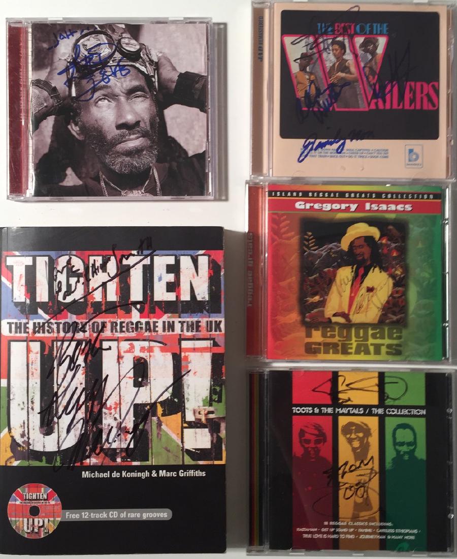 REGGAE STARS SIGNED: REGGAE STARS SIGNED. Five signed items to include: four CDs bearing signatures variously from:Gregory Isaacs, Lee Scratch Perry, Aston Barrett and three other members of the Wailers, Toots Herbert and