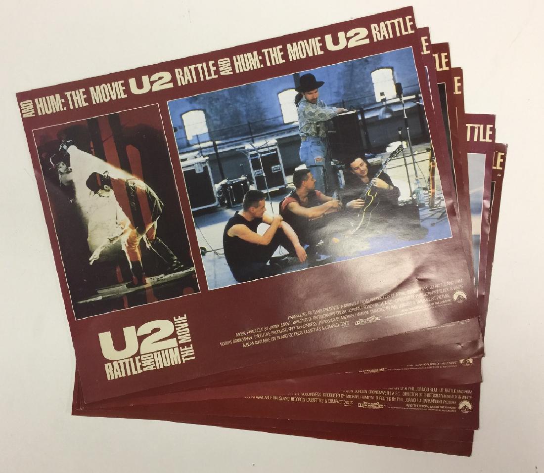 U2 RATTLE AND HUM LOBBY CARDS: U2 RATTLE AND HUM LOBBY CARDS. Seven original lobby cards for U2 - Rattle and Hum. Each to measure 14 x 11" and in very good condition, with light creasing.