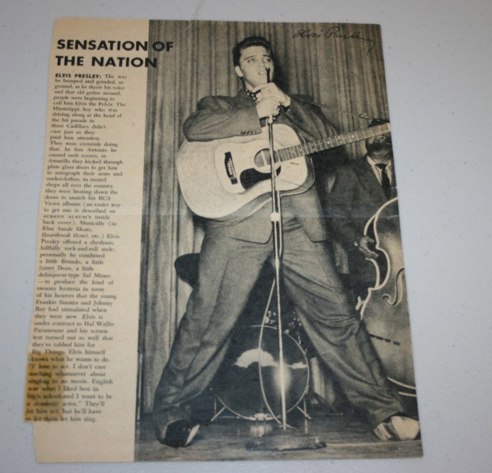 ELVIS PRESLEY: ELVIS PRESLEY - magazine article signed by Elvis Presley in black pen. The article itself documents the 'mob scenes' and hysteria of his tours and has a large black and white photo of the singer perfo