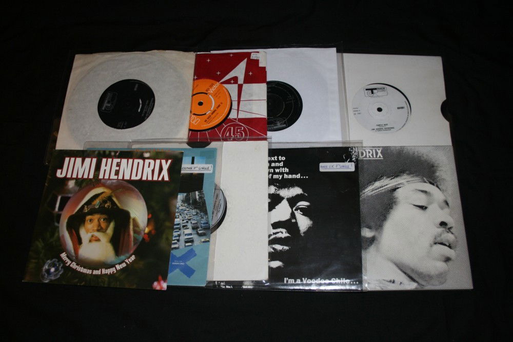 JIMI HENDRIX SINGLES COLLECTION: JIMI HENDRIX SINGLES COLLECTION - collection of nine 7" singles and rarities to include 'No Such Animal (Part 1/2)' (RCA2033), 'Merry Christmas and Happy New Year' on green vinyl (5651-7), 'Crosstown
