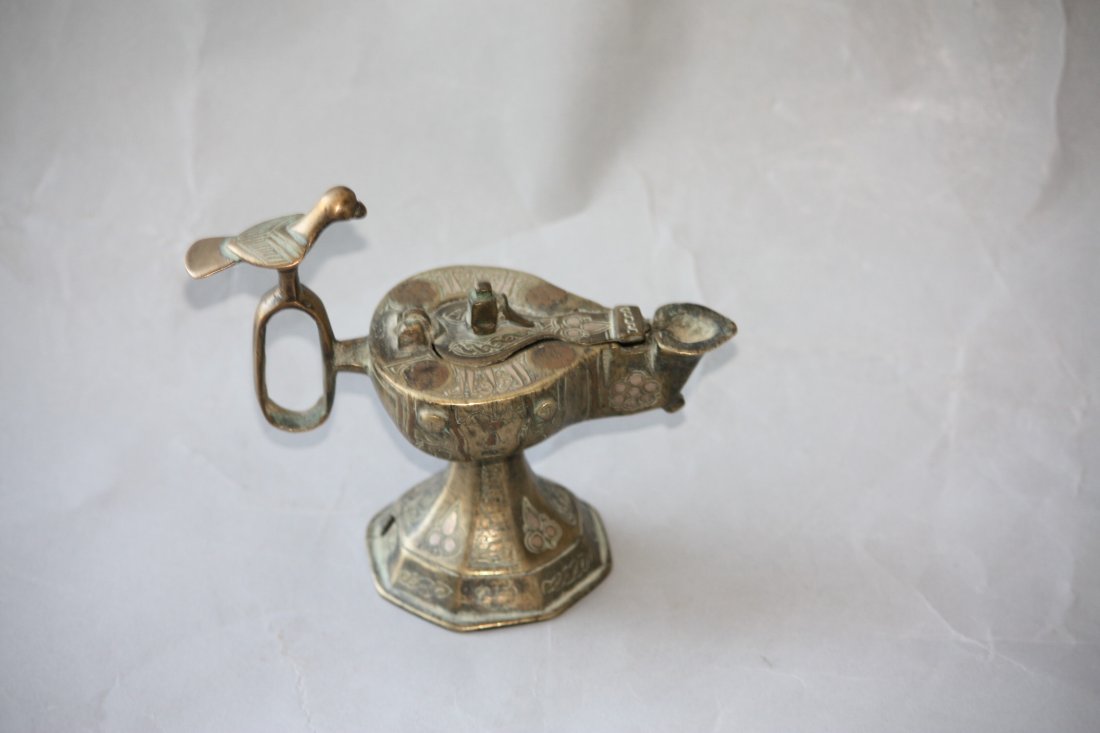 Antique Islamic Bronze Silver & Copper Oil Lamp: Antique Islamic Bronze Silver & Copper Inlaid Oil Lamp featuring islamic verse and Beautiful detail. Measures 5 Inches Tall.