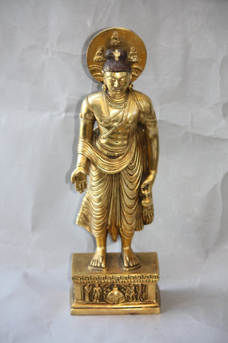 Bronze Sino-Tibetian Standing Buddha with Halo: Bronze Sino-Tibetian Standing Buddha with Halo that has Seated Buddhas on it. This Buddha is also coved with Buddhist designs and scenes. Measures 13 1/2 inches Tall.
