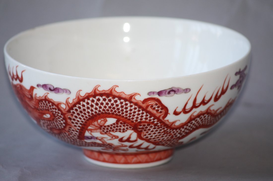 Two Antique Chines Bowls: Two Antique Chinese Bowls; one with Dragons on the outside and bats on the inside;The other with three colors enamelled all over, beautiffully painted and moulded. D; 5 Inches