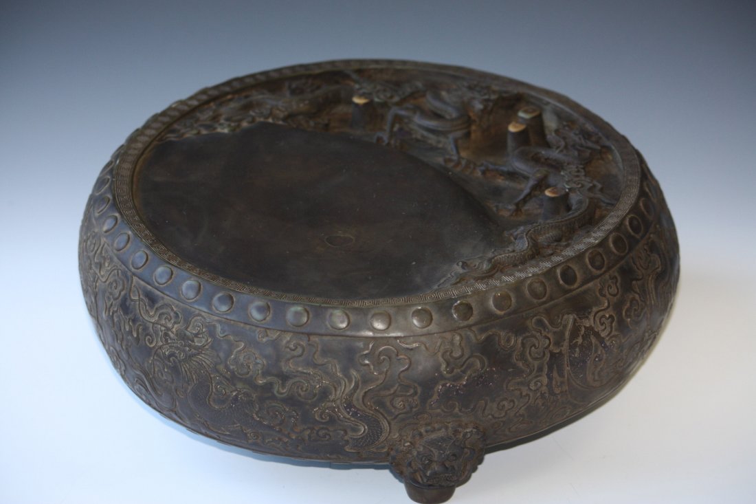 Chinese Round Tripod Inkstone with Carved Dragons: Chinese Round Tripod Inkstone with Carved Dragons and Ocean designs.D: 16 Inches