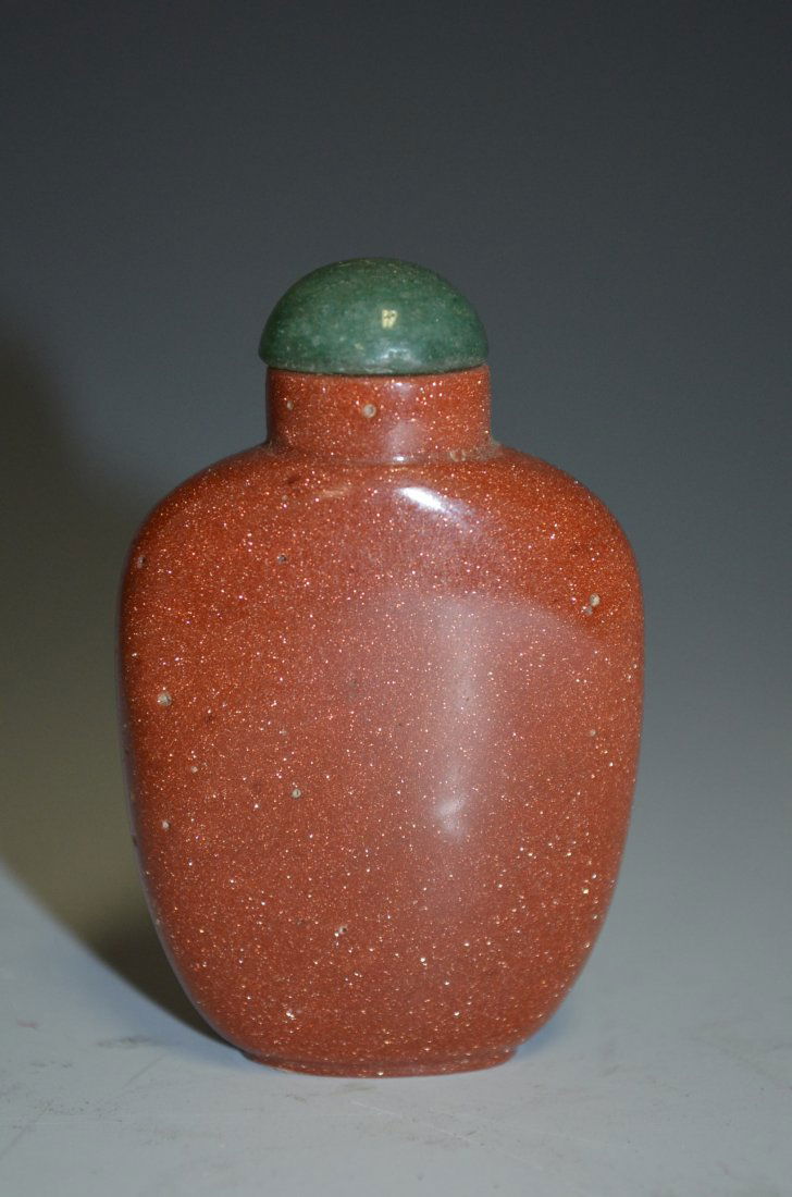Golden Star Stone Chinese Carved Snuff Bottle: Golden Star Stone Chinese Carved Snuff Bottle. H: 2 1/2 Inches