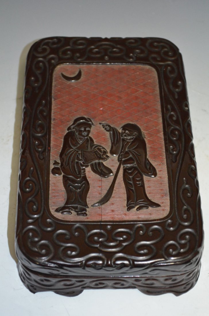 A Carved Cinnabar Box: A Carved Cinnabar Box, L: 9 Inches