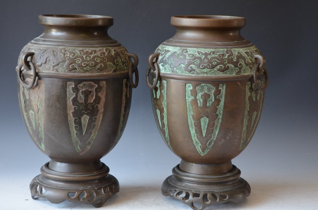 Pair of Bronze Vases On Bronze Bases