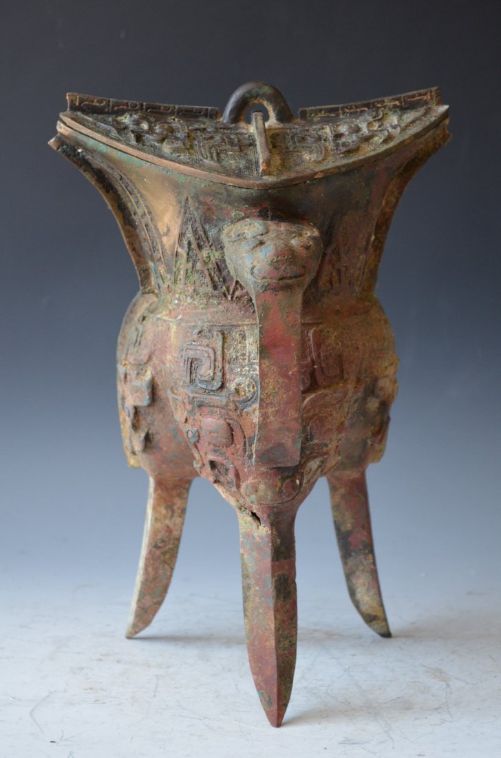 Chinese Archaic style Bronze Tripod Lidded Ding: Chinese Archaic style Bronze Tripod Lidded Ding with Handle, Probably Shang Dynasty, H :12 Inches