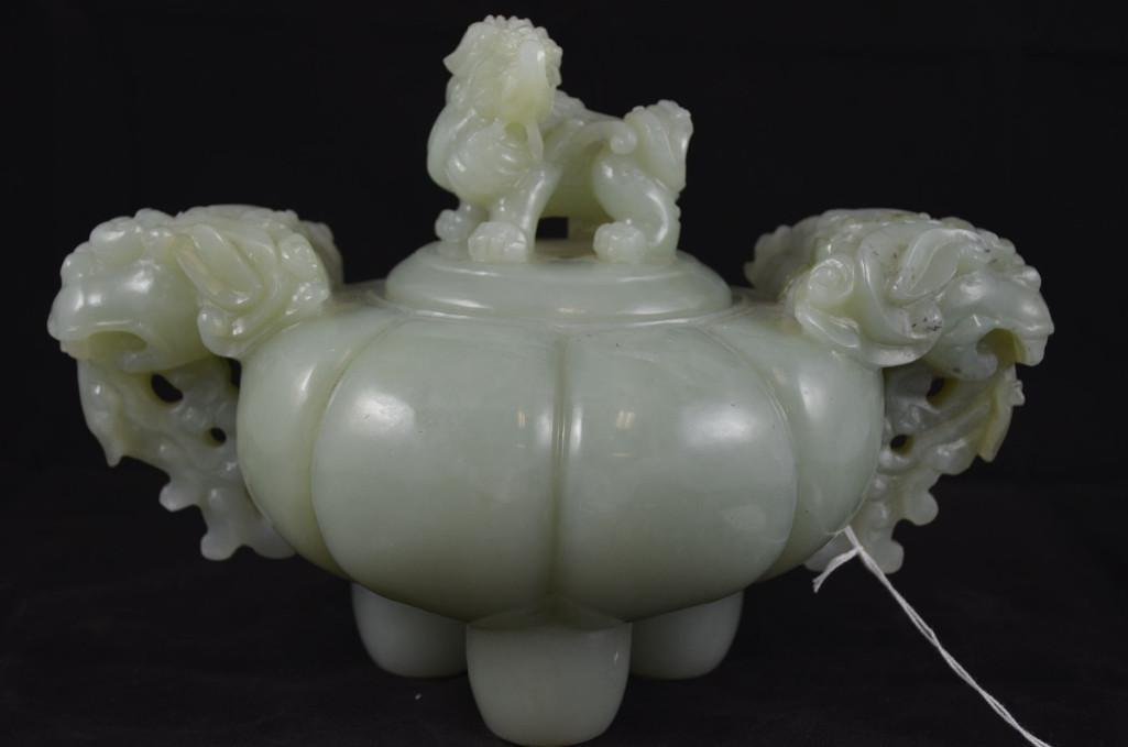 Carved Celadon Jade Lidded Tripod Censer: Carved Celadon Jade Lidded Tripod Censer with a Chiling on the Lid. The handles are in the form of a Chiling Head. L: 10 1/2 Inches