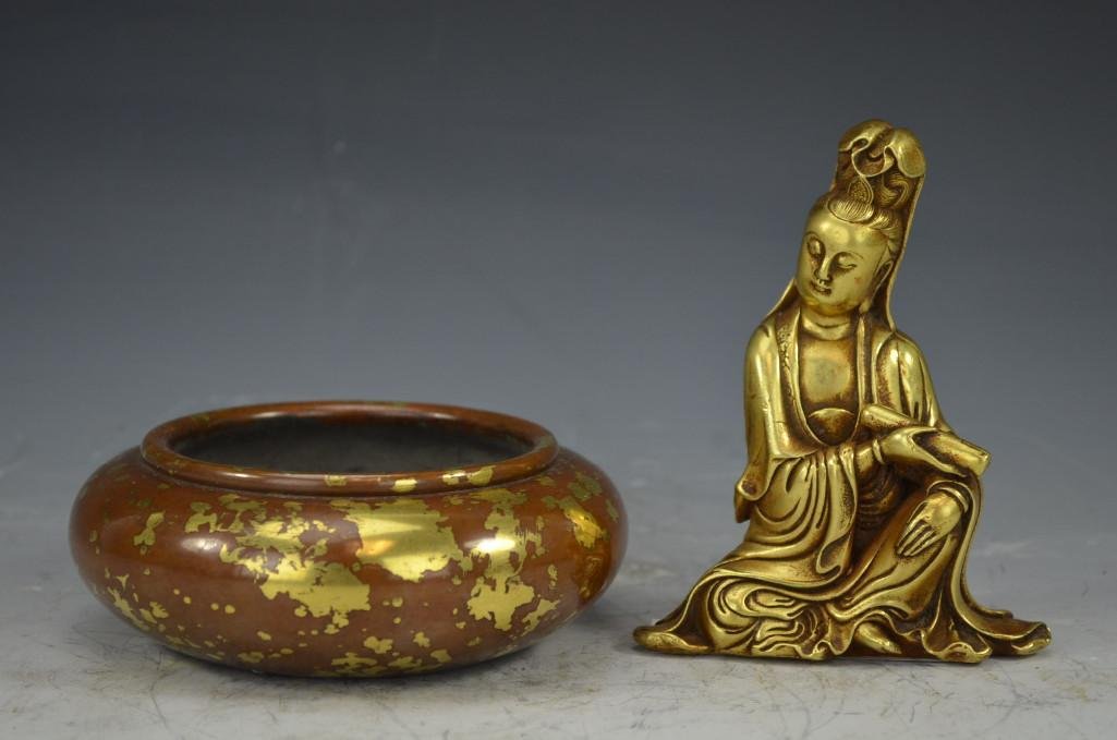 Two Chinese Bronze Items: Two Chinese Bronze Items; one gold splash bronze brush washer; one bronze seated Quan yin H: 5 Inches