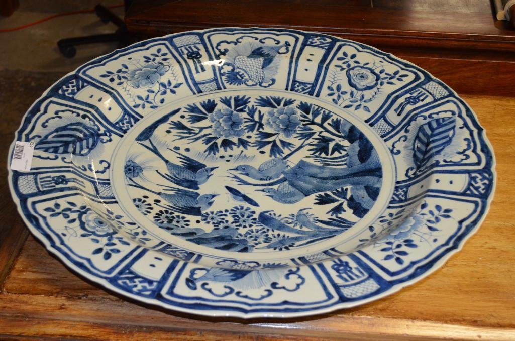 Large Chinese Blue & White Glazed Charger: Large Chinese Blue & White Glazed Charger, with decorations of Buddhist Symbols, Plants and Birds; D: 27 Inches