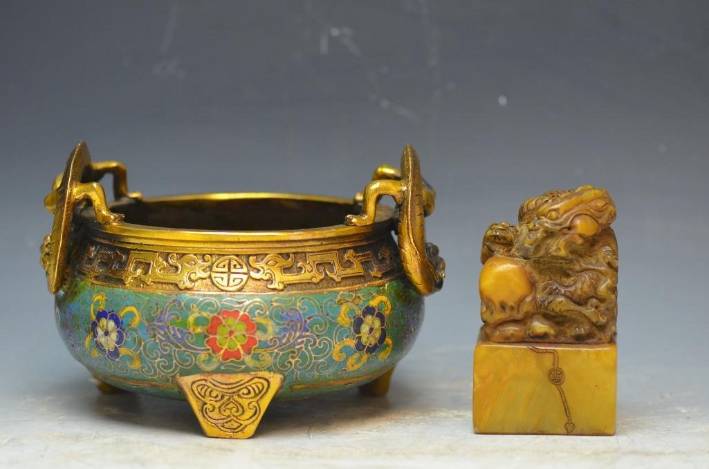 Two Chinese Items; Cloisonne Tripod & Stone Seal: Two Chinese Items; One Bronze with Cloisonne Tripod Bowl/Censer & A Chinese Carved Soapstone Seal. (cloisonne) D: 7 Inches