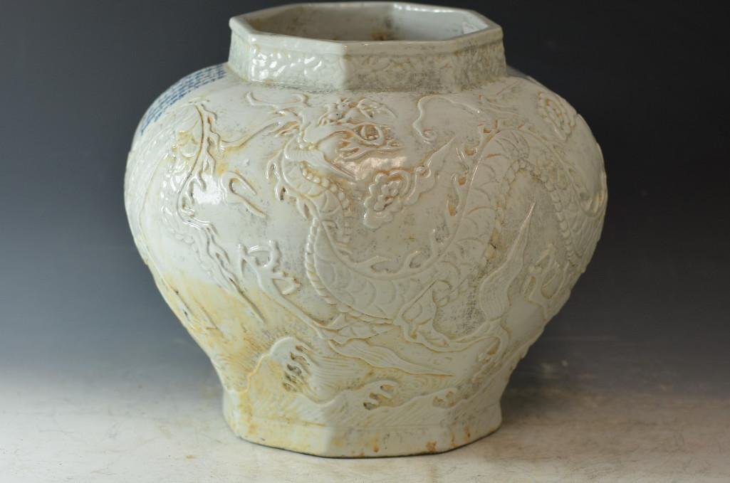 Chinese White Glaze Dragon Vase with Calligraphy: Chinese White Glaze Dragon Vase with Blue Chinese Calligraphy Verses on Shoulder and A Makers Mark on Base. D: 13.2 Inches