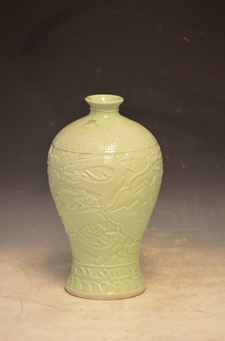 Chinese Pale Green Glaze Celedon Porcelain Meiping: Chinese Pale Green Glaze Celedon Porcelain Meiping Dragon With Underglaze Incised Dragon Decoration In High Relief. With Blue Mark in Base; H: 13 Inches