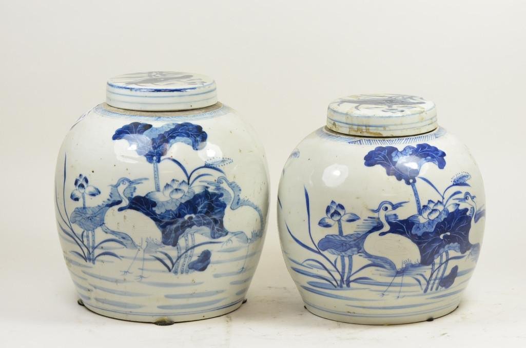 Two Blue & White Porcelain Vases: Two Blue & White Porcelain Vases; Two Blue & White Porcelain Chinese Lidded Vases Both Depicting Cranes In Lake; H: 9 Inches