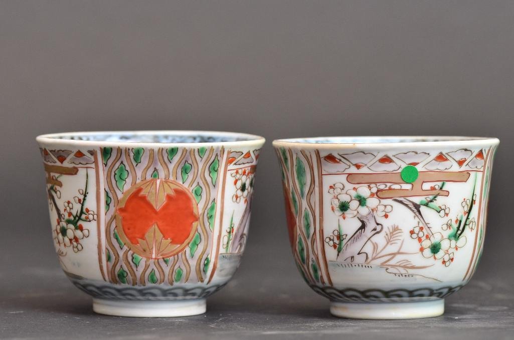 Pair of Chinese Porcelain Cherry Blossom Flower Cups: Pair of Chinese Porcelain Cherry Blossom Flower Cups made of very fine and delicate porcelain and handpainted with beautiful shades of red, gold, and green featuring a branch of cherry blossoms with b