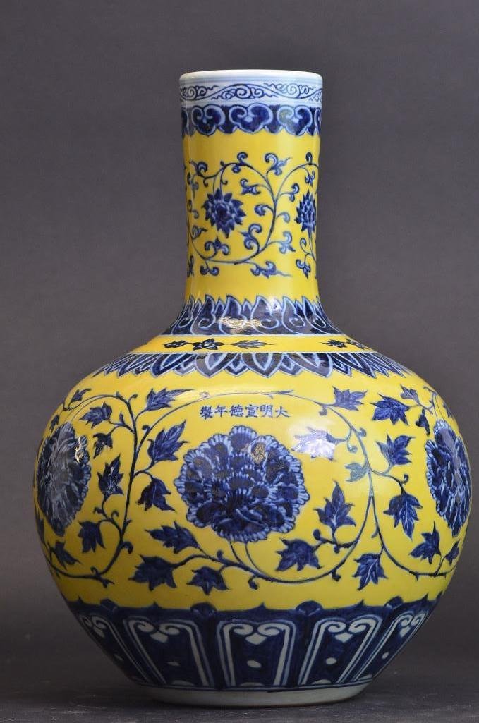 Antique Chinese Yellow and Blue Glaze Porcelain Vase: Antique Chinese Yellow and Blue Glaze Porcelain Vase with swirling floral patterning; H: 16 Inches