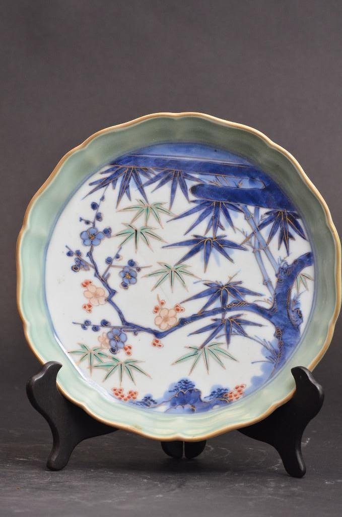 Antique Chinese Handpainted Underglaze Blue Plate: Antique Chinese Handpainted Underglaze Blue Porcelain Plate with red, green, and gold overpainting of bamboo shoots and cherry blossom branches, signed mark ot the base; D: 8.75 Inches