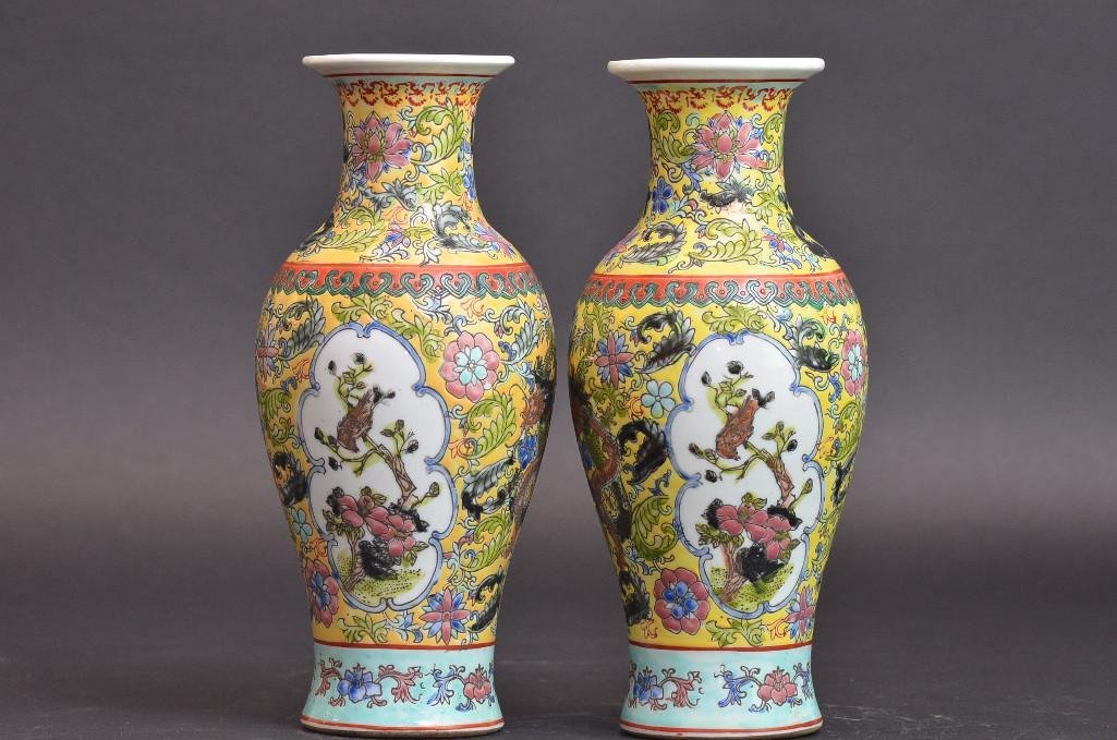 Pair of Chinese Famille Rose Porcelain Vases: Pair of Chinese Famille Rose Porcelain Vases with beautiful floral pattern throughout with images of birds perched upon tree branches, with seal mark on base; H: 10 Inches