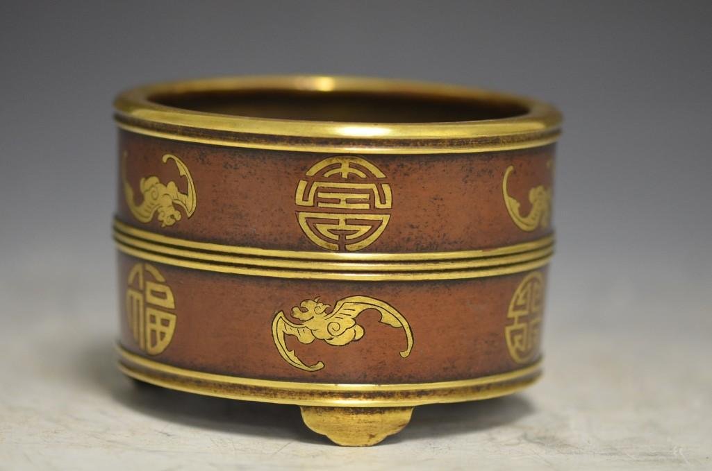 Chinese Gilt Bronze Footed Censer with Buddhist Emblems: Chinese Gilt Bronze Footed Censer with Buddhist Emblems; D; 4.5 Inches