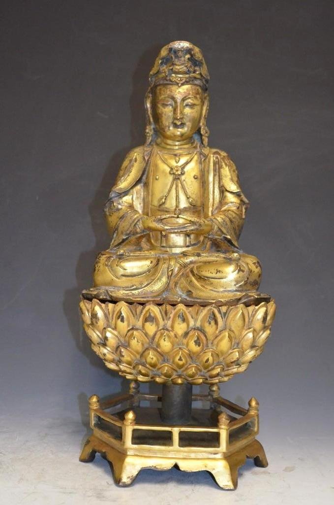 Antique Ming Dynasty Gilt Bronze Seated Buddha: Antique Ming Dynasty Gilt Bronze Seated Buddha on a Bronze Lotus Bed Stand, Total Height : 17 inches , Buddha Height: 10.25 Inches