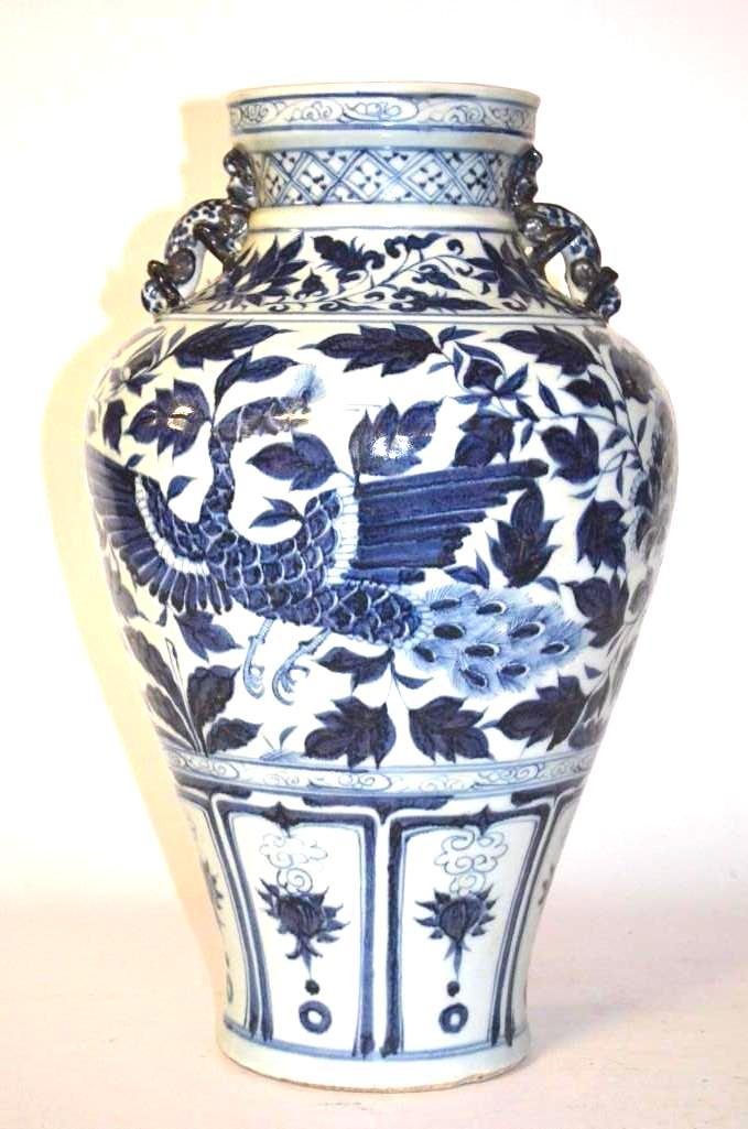 Chinese Blue & White Porcelain Vase With Chi Ling Handl: Chinese Blue & White Porcelain Vaes with Chi Ling Handles With Continuous Underglaze blue painting depicting phoenixes amongst flowers & Foliage; H: 17.5 Inces