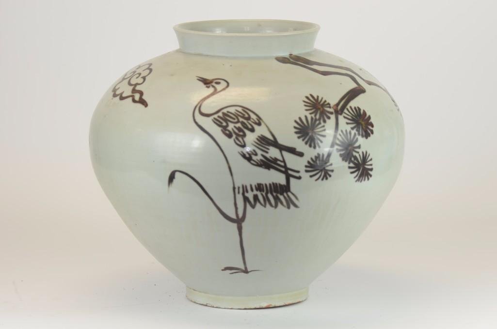 Korean Porcelain Under glaze Brown/red Jar: Korean Porcelain Under glaze Brown/Red Jar . Under glaze Painting Depicting a scene of Cranes amongst vegetation; Height: 14 Inches