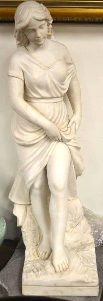 Carved White Marble of A Lady Stepping Into A River (1 of 4)