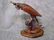 23: Sculpture -" Falconry Peregrine Settling In" mixed