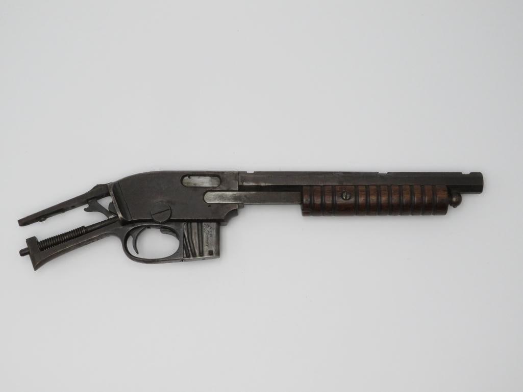 Savage Model 1903 Slide Action Rifle Action: s.n.. 76832, .22 S-L-LR, , barrel cut down, no stock, action stuck, with (1) period Savage magazine. C&R (23-0160)