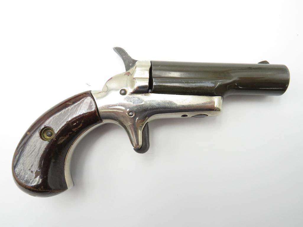 Colt Derringer Single Shot Pistol: s.n.69024D, .22 Short, wood grips, original Colt Derringer presentation box. Modern (23-0597)