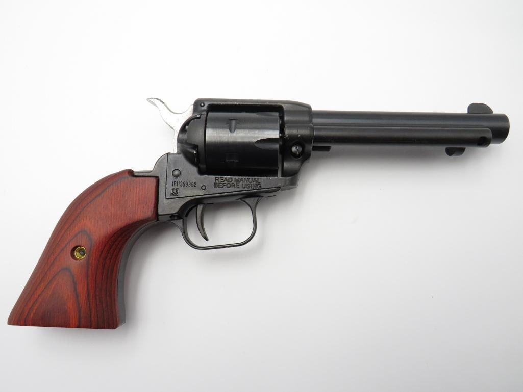 Heritage Rough Rider Single Action Revolver: s.n. 1BH359852, .22 LR, 4.75" barrel, 6 shot, wood grips, factory box and documentation. Modern (23-0629)
