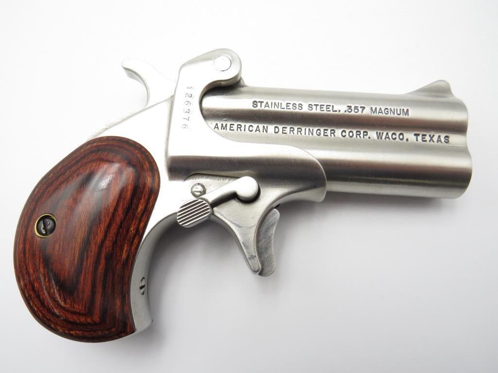 American Derringer Over/Under Derringer: s.n. 126376, .38 Special/.357 Magnum, 3"barrel, stainless steel, with original box. Modern (23-0511)