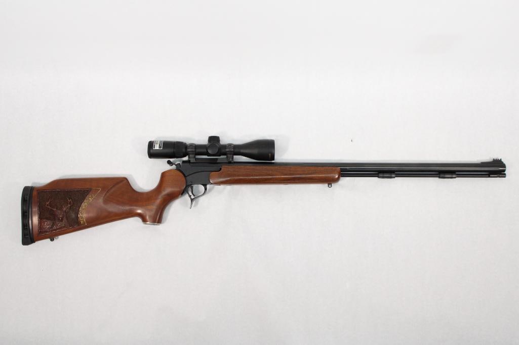 Thompson/Center Encore Single Shot Rifle: s.n. 87422, .50 cal. muzzle loading barrel, w/ Nikon omega 3-9x scope, carving on right side of stock, Modern. (24-0106)
