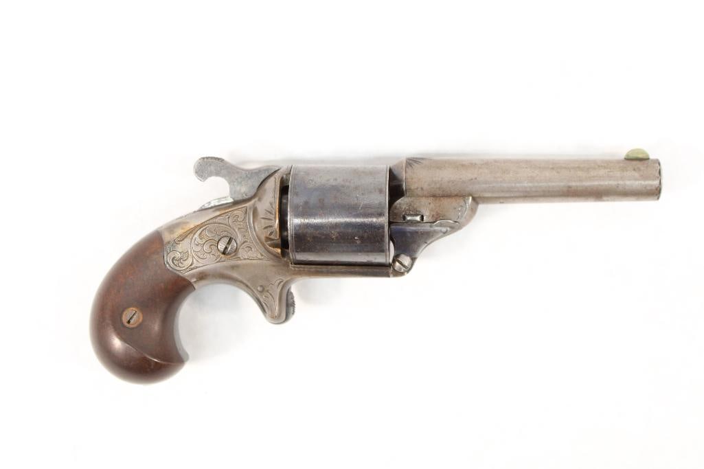 Engraved Moore's Patent Firearms Single Action Revolver: s.n.. 3892, .32 teat fire. Antique