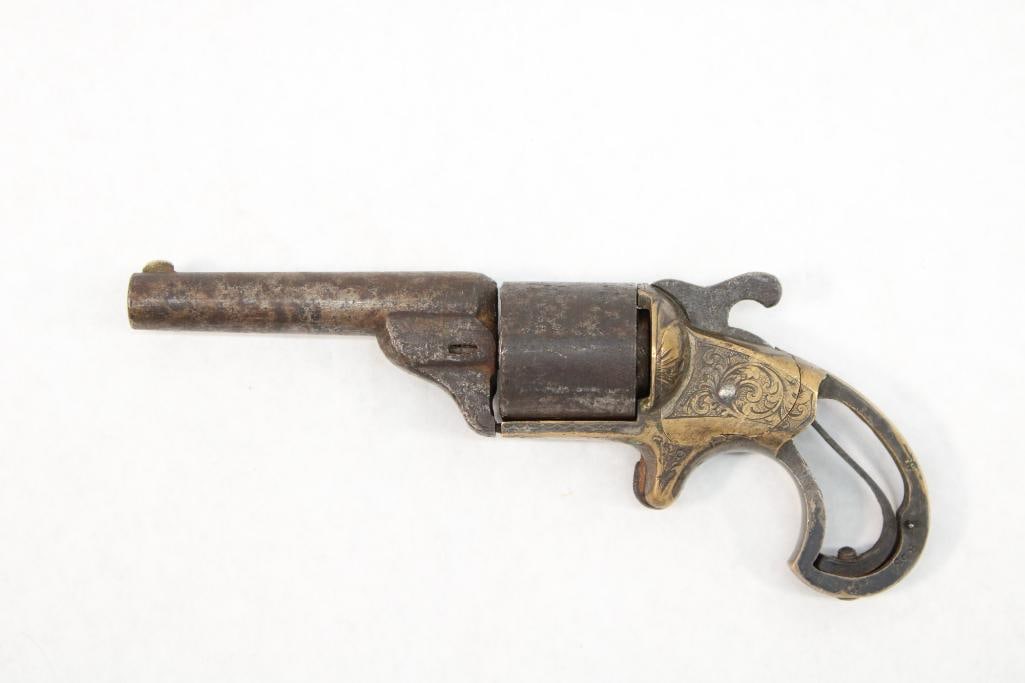 Moore's Patent Firearms Co. Single Action Revolver: s.n.. 9853, .32 teat fire, lacking grips, action faulty, frame / barrel disconnected. Antique