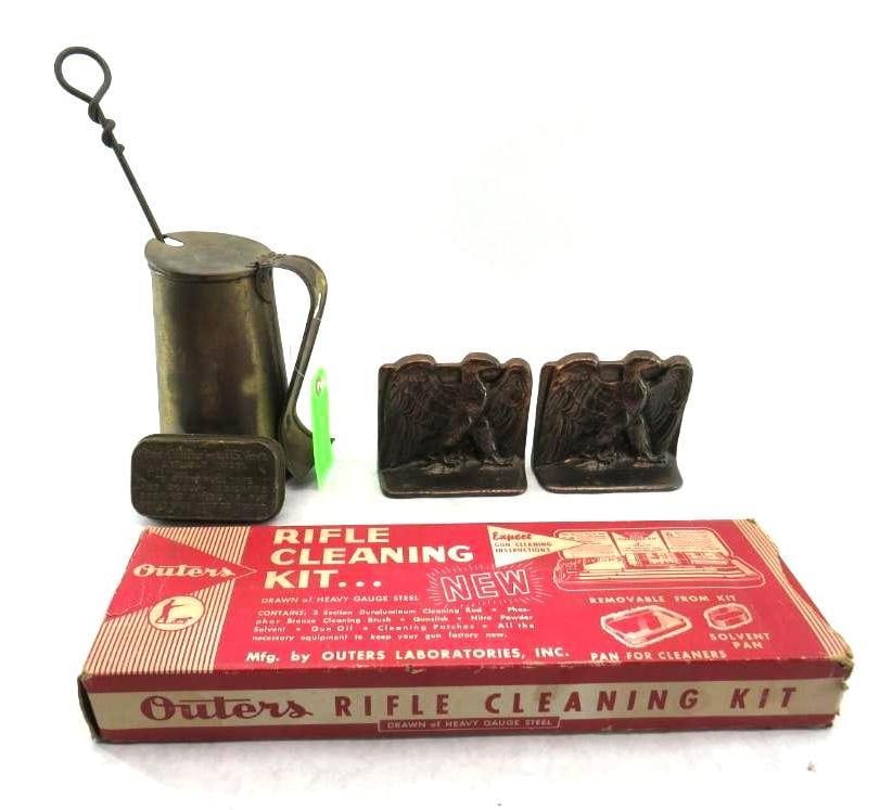 Collectibles Lot: gun cleaning kit, mostly complete; patinated metal eagle bookends; Cape Cod fire starter; U.S. Gov't first aid packet