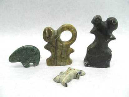 (2) Inuit Carvings & (2) Stone Fetishes: The two large figures are Inuit carvings by George Arluk. The two smaller figures are Southwest Native American fetishes 