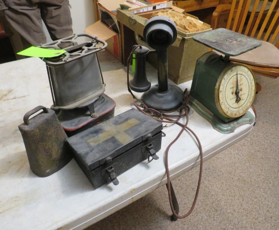 Tin & Metal Collectibles: incl. oil stove, telephone, family scale, cowbell, etc., Location: basement