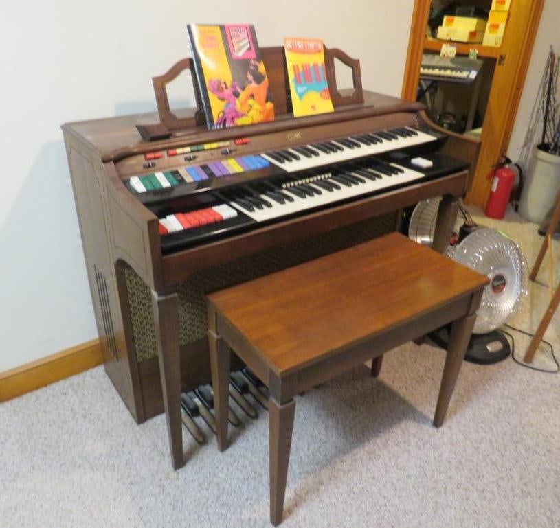 Conn Strummer Organ: includes qty. of sheet music, Location: basement
