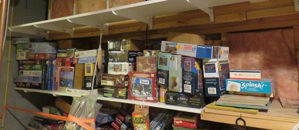 (40+/-) Puzzles: on top shelf, Location: basement
