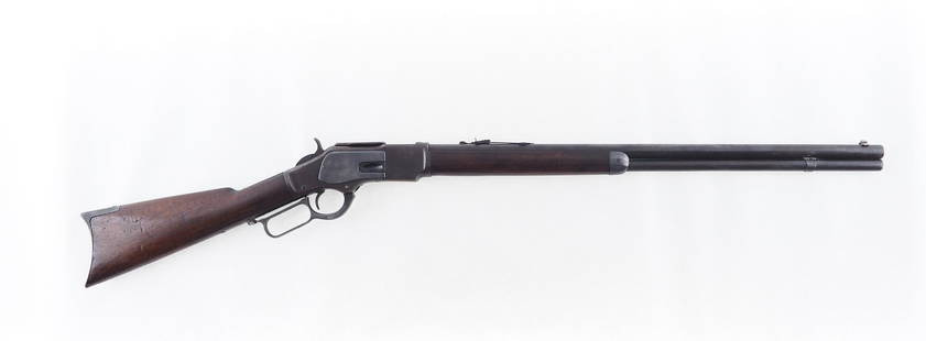 Winchester Model 1873 Lever Action Rifle: s.n. 217258B, .38 cal., 24" round barrel, full magazine, ca. 1886. Antique 