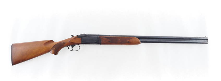 Savage Model 330 Over/Under Shotgun: s.n. 33762V, 12 Ga., 28" plain barrels, 2.75" chambers, modified and full chokes, single trigger, extractors, geometric engraved frame and trigger guard, checkered stock and forend, 14" l.o.p. Made
